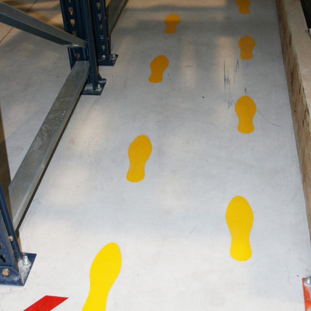 Zelfklevend vloermarkeringssymbool, Voetafdruk